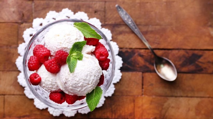 Coconut ice cream with raspberries