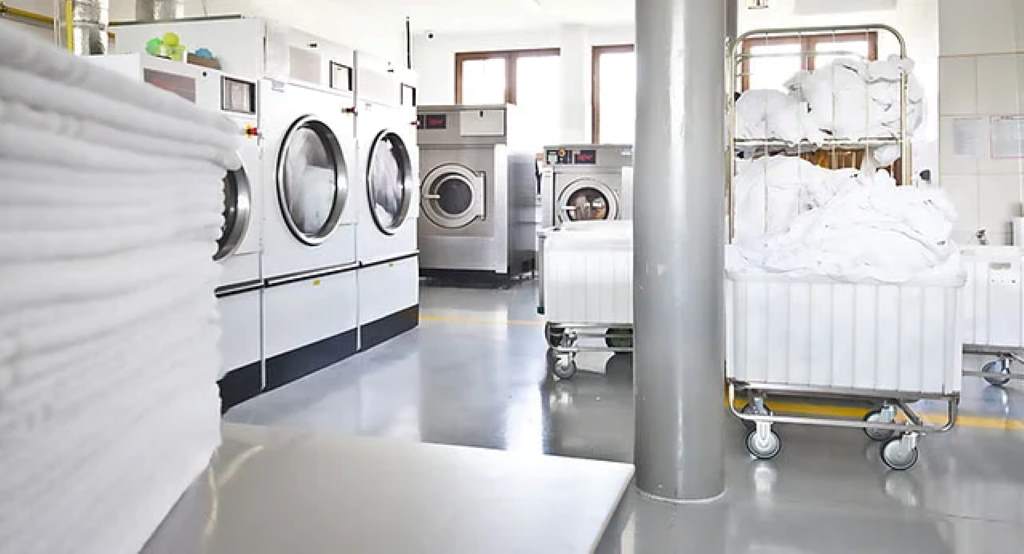 Industrial laundry machine in a commercial setting