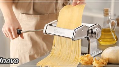 Close-up of Sailnovo pasta maker making fresh pasta during review.