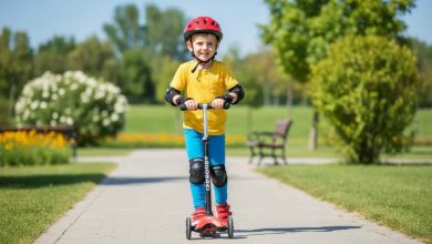 Young child wearing BOSONER knee pads, elbow pads, and wrist guards while riding a scooter safely outdoors