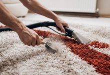 Removing embedded debris from residential carpet fibers