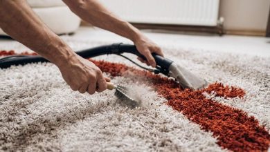 Removing embedded debris from residential carpet fibers